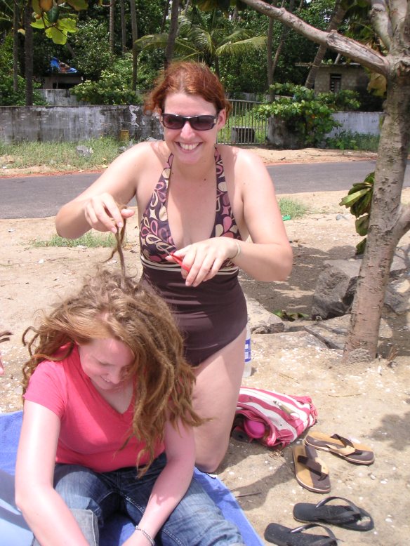 Cutting off this Swedish girl's dreadlocks on the beach, like you do....